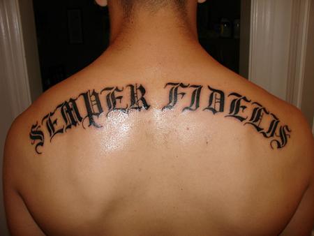 Back Piece Tribal Letter Tattoo