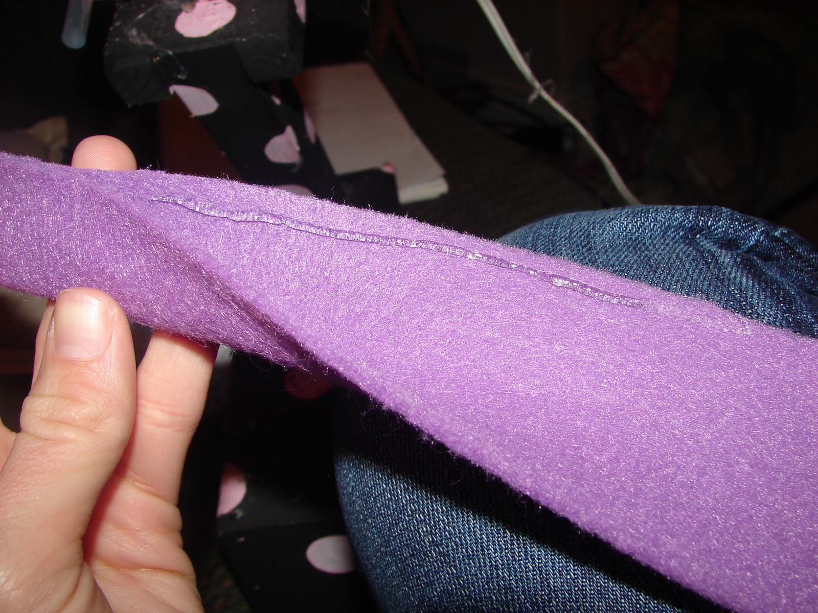 A girl and a glue gun felt flowers.