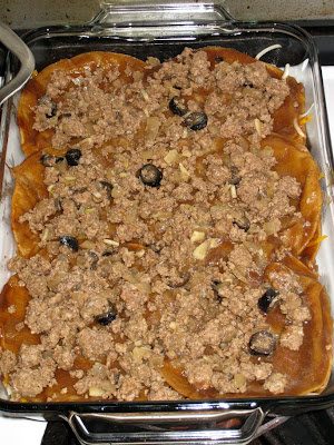 Add meat on top of tortilla layer