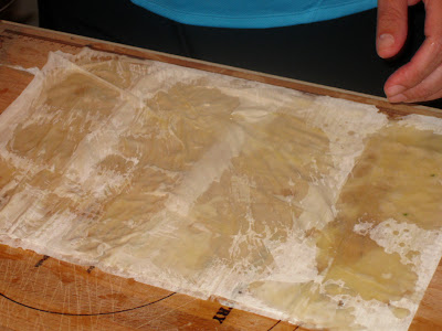 Stacking sheets of phyllo dough