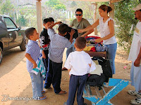 students receiving donated clothing