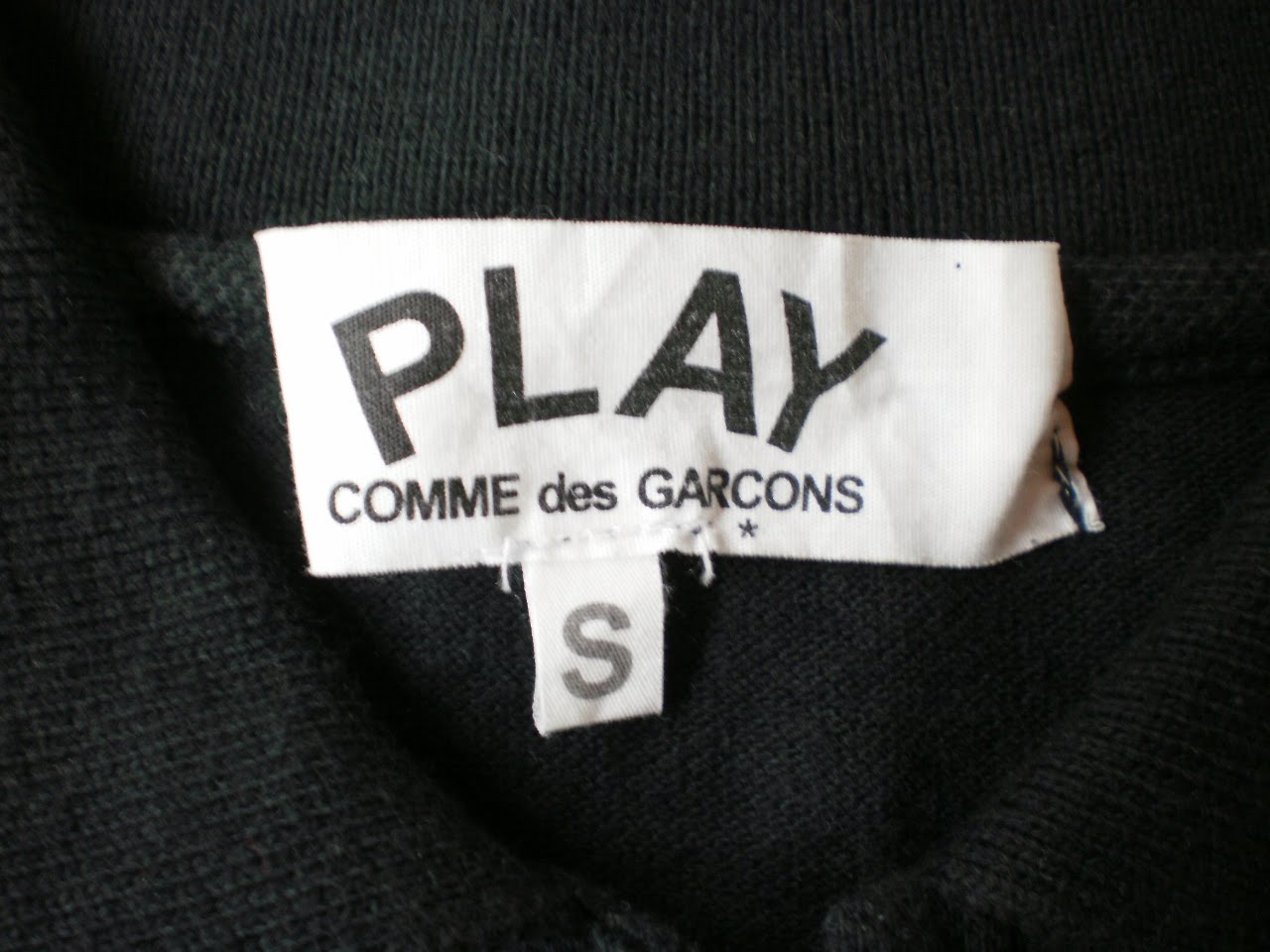 comme des garcons play tag
