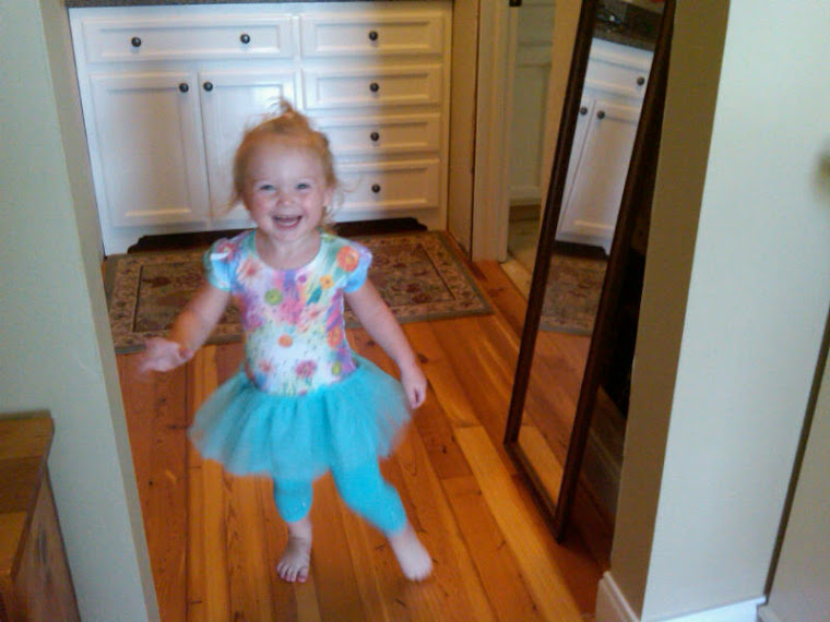Sarah loves to dance on the wood floors!