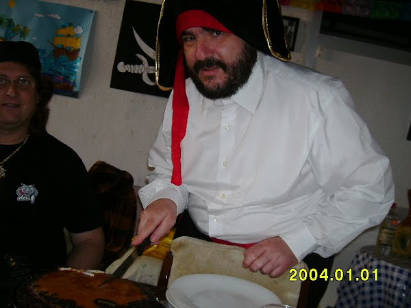 Barba Negra cortando su tarta.Fin.