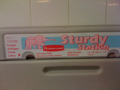 Pink child and parent elephants with label that reads Sturdy Station