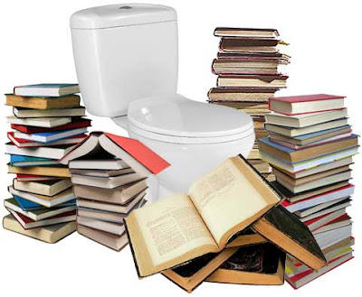 White ceramic toilet surrounded by stacks of books