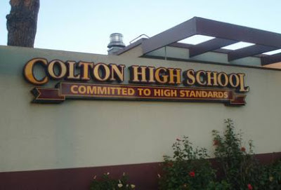 The same sign reading Sign reading Colton High School committed to high standards