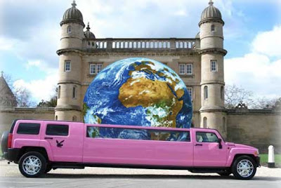 Pink Hummer stretch limo with an Earth ball coming out of the sun roof