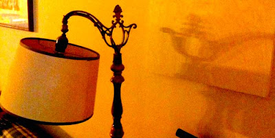Lamp casting a shadow that looks like a genie's lantern