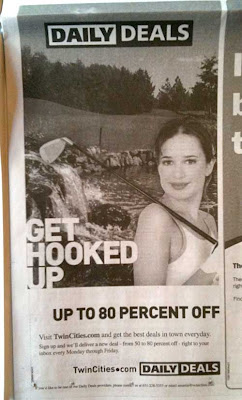 Newspaper ad with large headline GET HOOKED UP along with photo of pretty young woman with a golf club