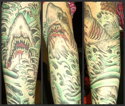 shark tattoo designs. wild shark tattoos design of