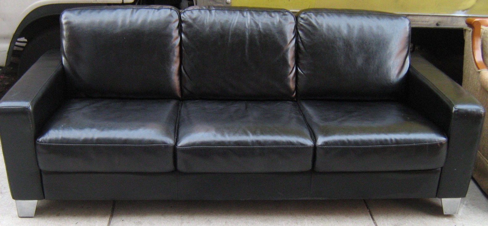 [black+leather+couch.jpg]