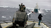 Japanese try blasting heli off deck with water cannons