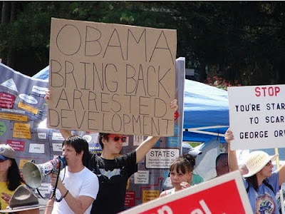 it's insanely overrated a hipster holding up a cardboard sign asking obama to bring back Arrested Development