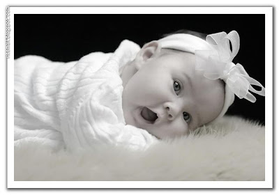 Cute Baby sleeping on the bed