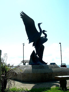 An Iron sculpture-fountain of cranes --just outside the art museum on the shore