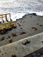 Normally this is for disabled to enter the beach...being washed 'under' by the surf