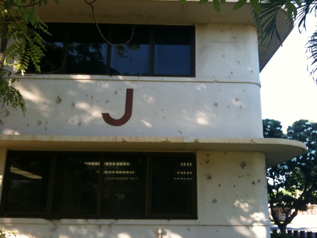 Chubby Brain Hickam Air Force Base building shot up by the Japanese