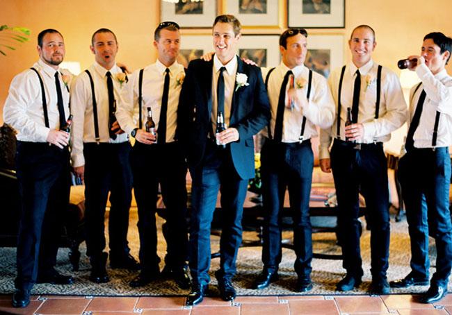 Groomsmen wearing suspenders.
