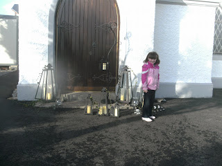 clearing away the candle lanterns