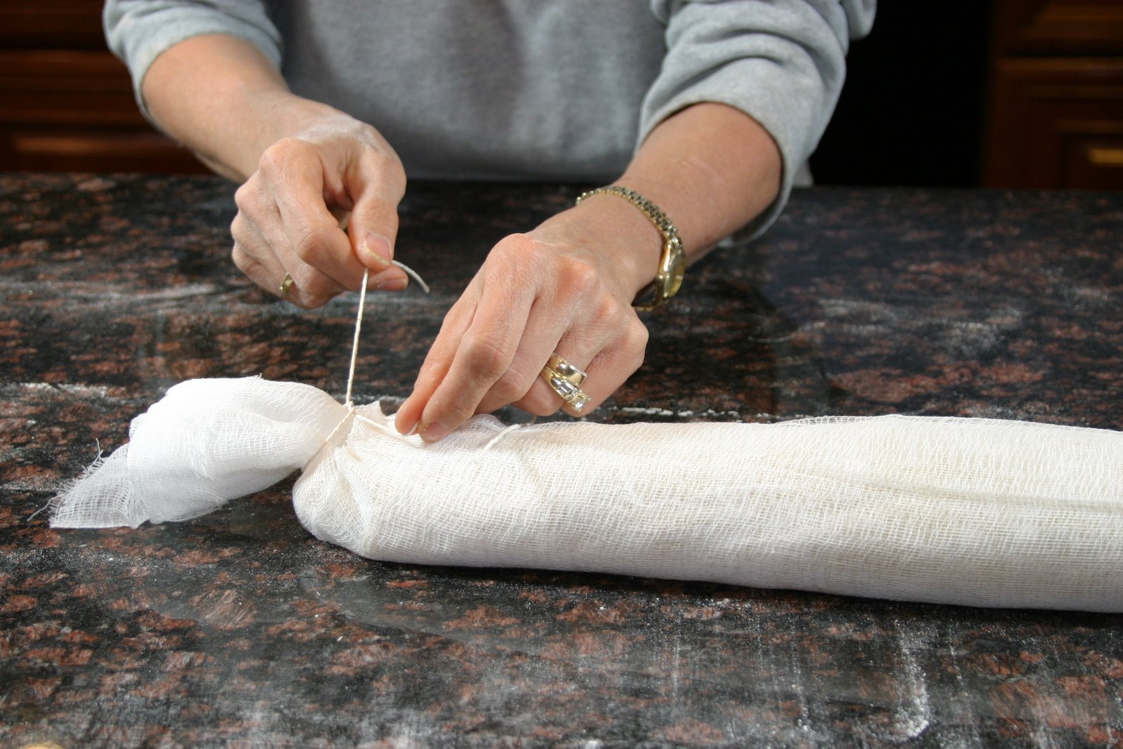 [tieing+cheesecloth.JPG]