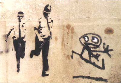 பேங்க்ஸி--வரைந்த "தெருவோர ஓவியங்கள்" - அட்டகாசமான ஓவியங்கள்... - Page 4 Banksy+Street+Art+Photos+%2829%29