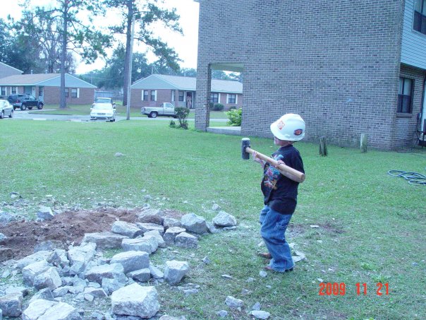 [jacob+busting+rock.jpg]