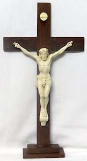 Jesus Christ nailed on wooden cross doll religious Christian photo