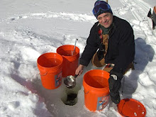 Getting water at camp.