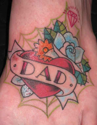 father tattoo. #39;Dad#39; tattoo on Kats foot