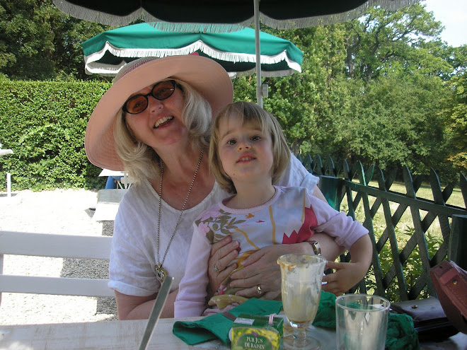 Wearing a hat in Paris with my granddaughter, Anaëlle