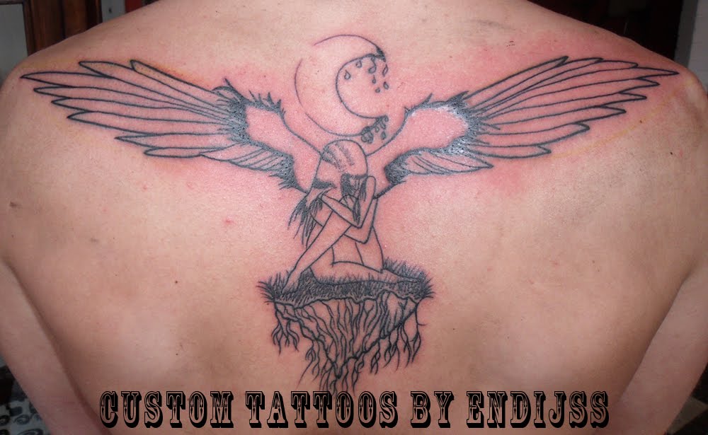 angel) has tattoos on his dark angel tattoos. angel) has tattoos on his