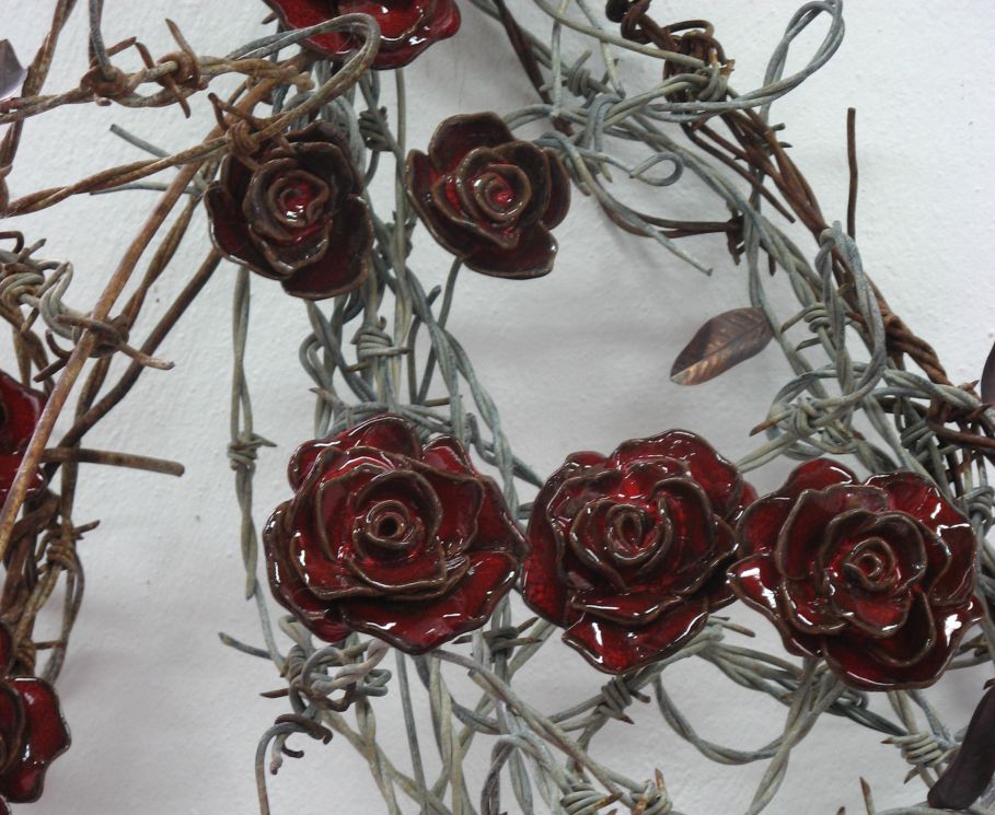 [barbed+wire+and+roses.jpg]