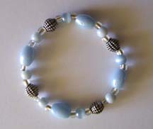 7.5" Light Blue Glass Bracelet $30.00