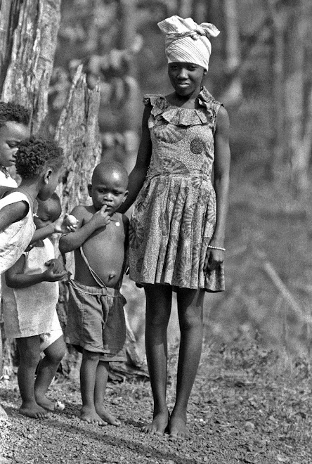 young girl with Massaquoi children - Dama Rd in Kenema