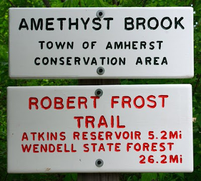 Trailhead sign for Amethyst Brook and the Robert Frost Trail in Amherst, Mass