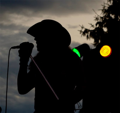 Silhouette of the lead singer for The Lynyrd Skynyrd Experience band