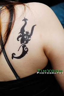 worms tattoo for female