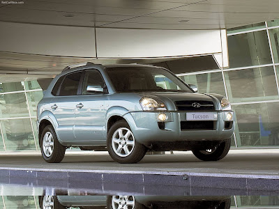Kia Carnival 2003 Hyundai Tucson 2005. Kia Carnival 2003