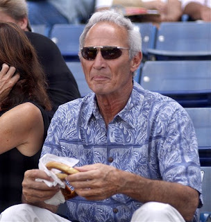 he's eating a pretzel because those Dodger Dogs are trayf