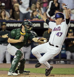 Tom Glavine gets tagged out at home