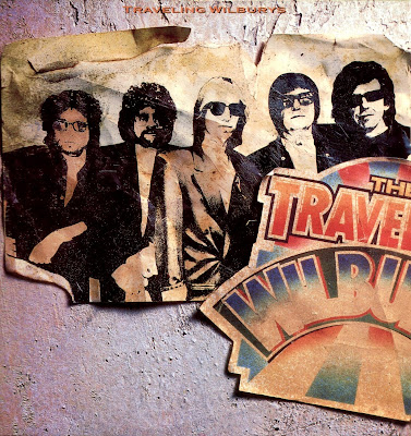 A rodar XV            - Página 4 The+Traveling+Wilburys+-+Vol.01+-+Front