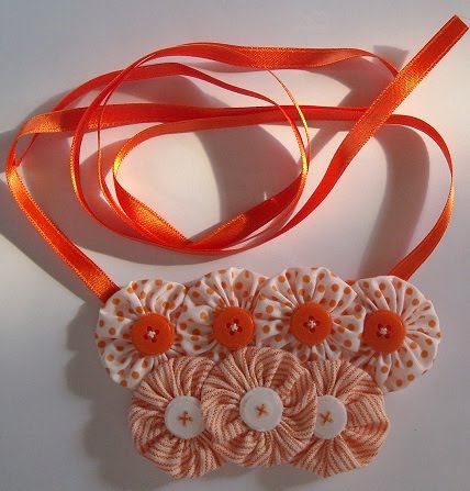 [collar+naranjas.jpg]