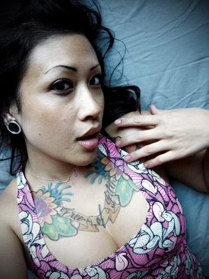 women chest tattoos hawaiian flower tattoo designs