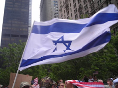 Demonstrators at the Ground Zero unfurl Israel Flag