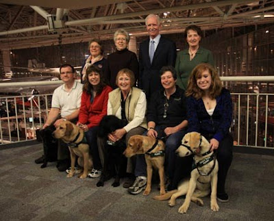 Captain Sullenberger with a group of Seattle puppy raisers