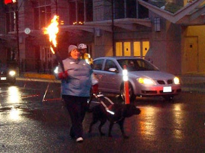 Heather and Nimitz in the torch relay