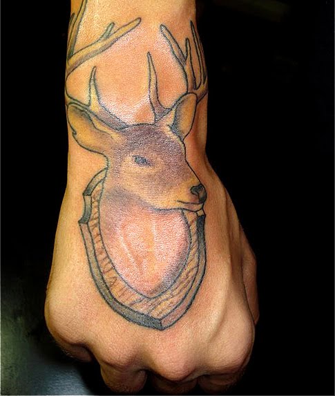 Never posted this beforebut heres a tattoo of a deer head i did about a 