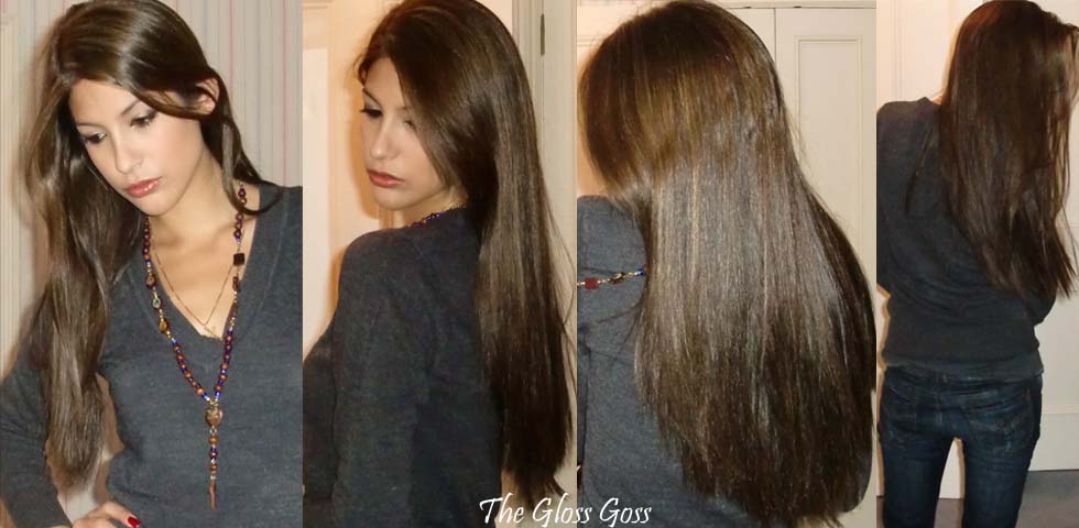 long brown hair extensions. dark brown shade but with totally unnatural-looking hair extensions to
