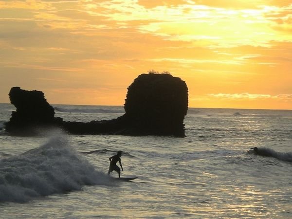 [1583228-Surfing-heaven-at-sunset-0.jpg]